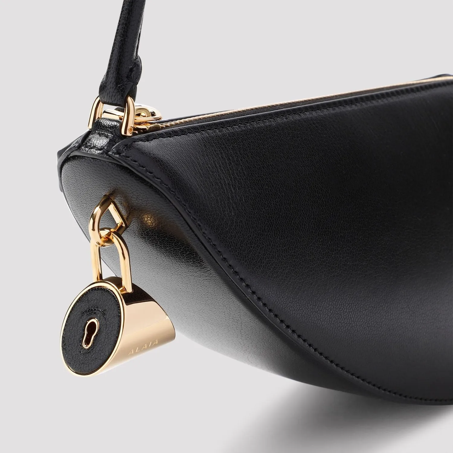 LE DEMI-COEUR SMALL LEATHER SHOULDER BAG