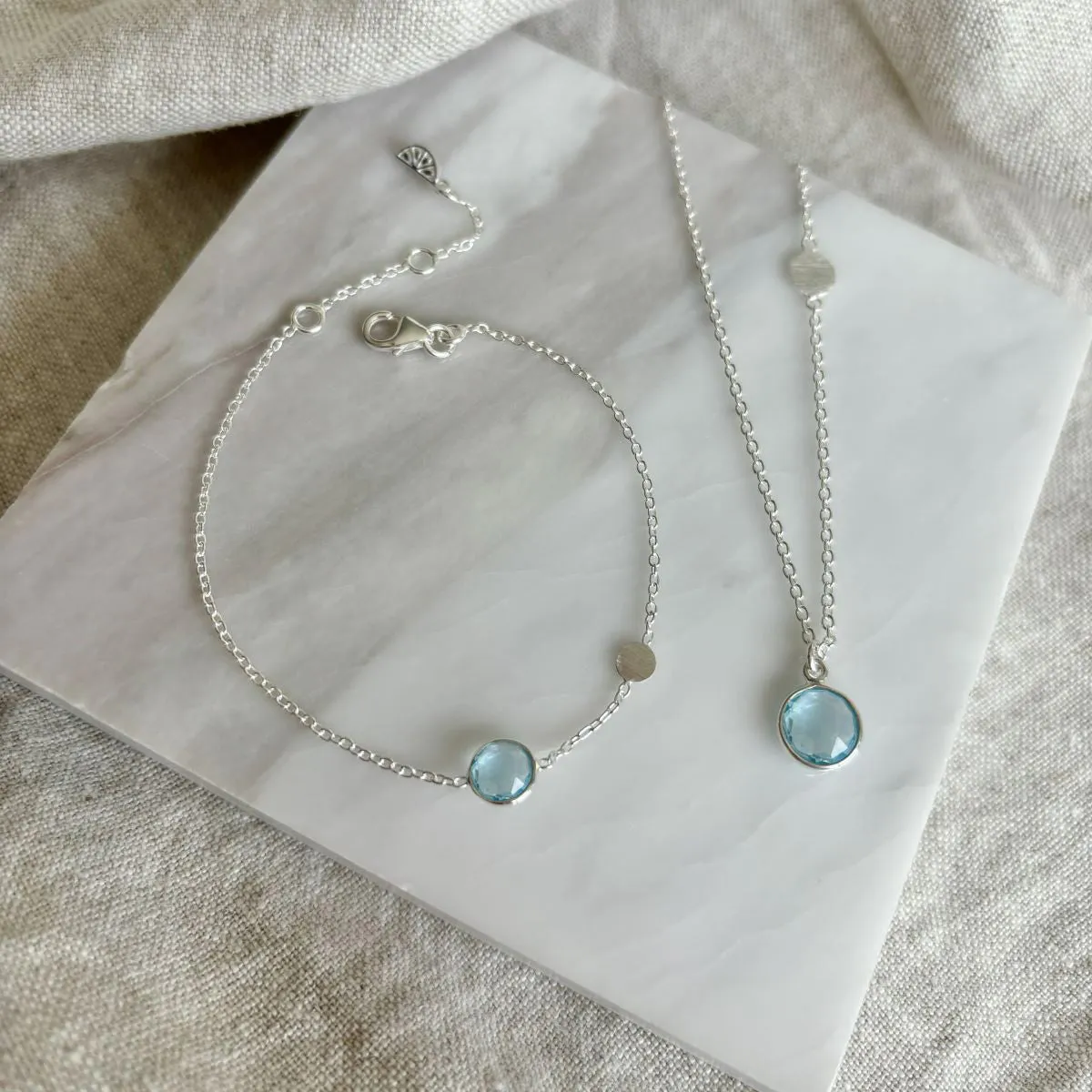 Salina Blue Topaz & Silver Disc Necklace